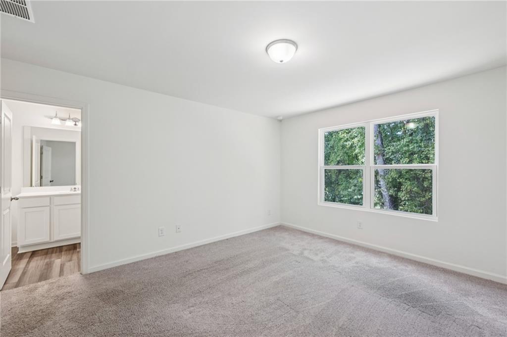 1653 Vernon Boulevard Decatur, GA 30035 - Photo 14 of 24 an empty room with a window