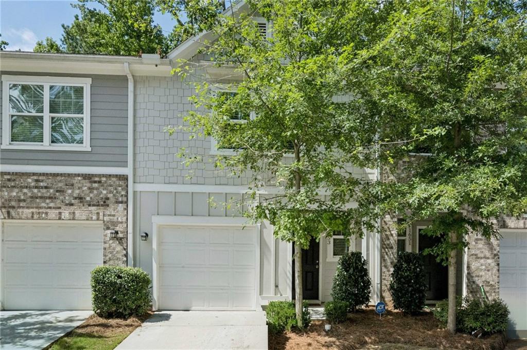 1653 Vernon Boulevard Decatur, GA 30035 - Photo 2 of 24 front view of a house with a tree