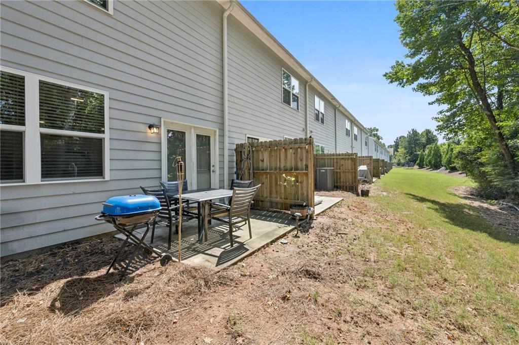 1653 Vernon Boulevard Decatur, GA 30035 - Photo 23 of 24 a view of a house with backyard and sitting area