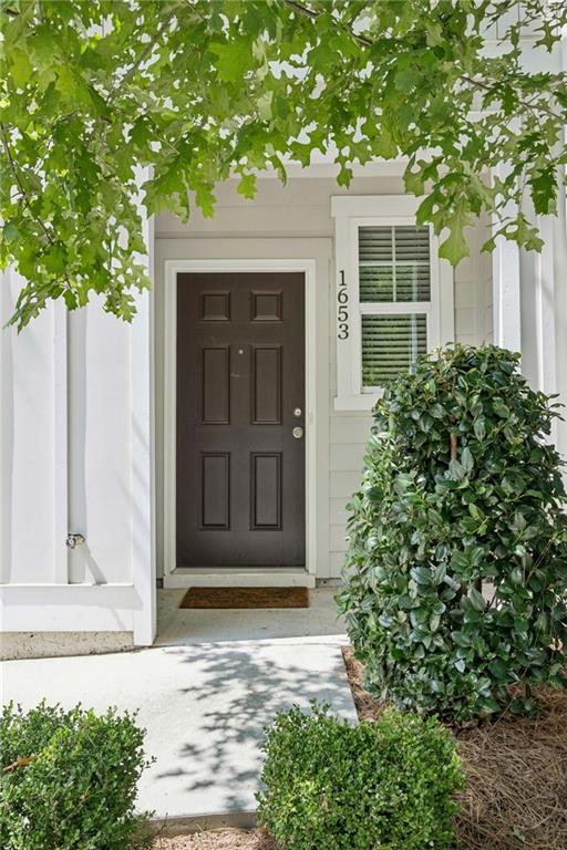 1653 Vernon Boulevard Decatur, GA 30035 - Photo 3 of 24 front view of a house with a small yard