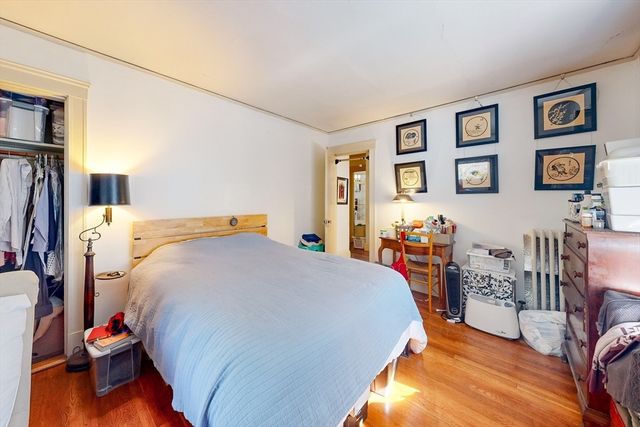 a bed room with a bed and a couch