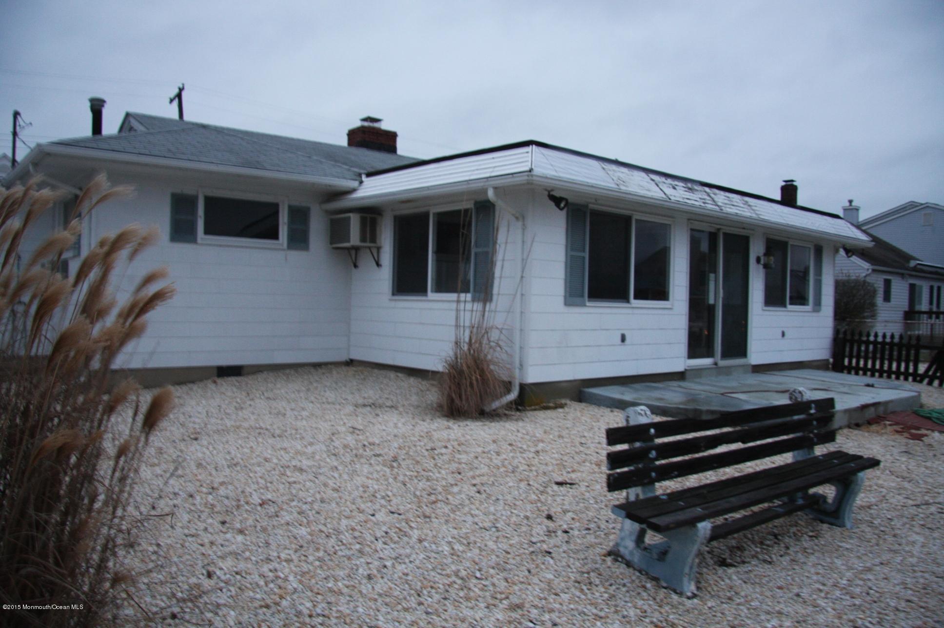 731 Drum Point Road Brick, NJ 08723 - Photo 5 of 11 a view of a house with a yard
