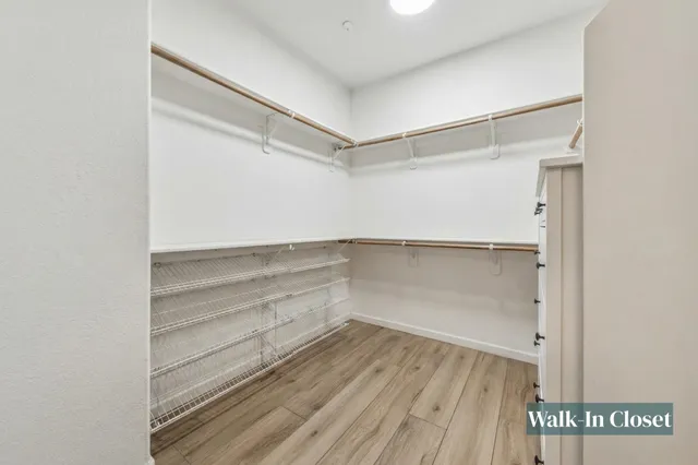 a picture of a bathroom with a shower