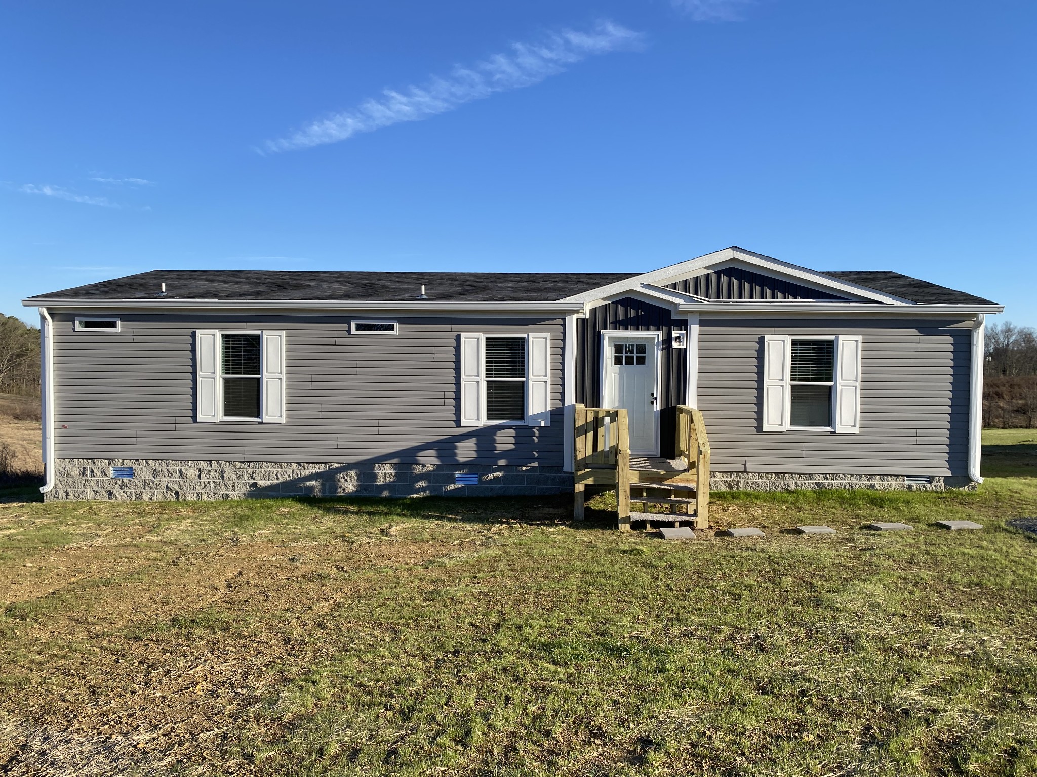 1710 Gamaliel Road Red Boiling Springs, TN 37150 - Photo 2 of 24 a front view of a house with a garden