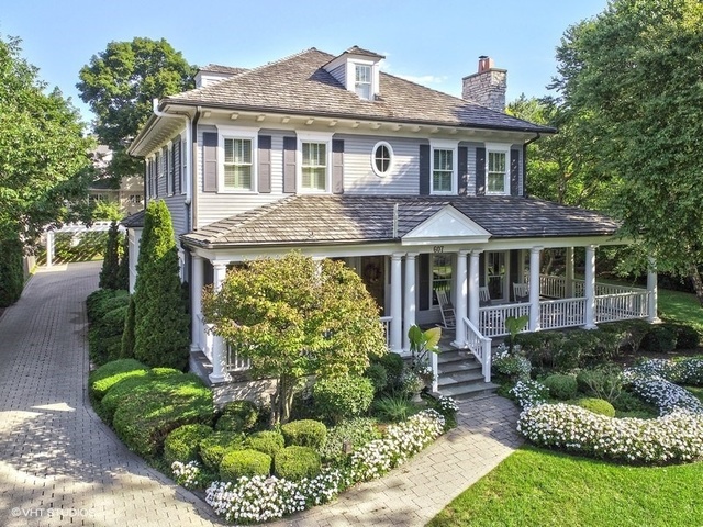 607 West Maple Street Hinsdale, IL 60521 - Photo 2 of 59 a front view of a house with a yard