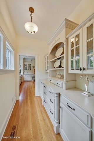 607 West Maple Street Hinsdale, IL 60521 - Photo 13 of 59 a spacious bathroom with a granite countertop sink a mirror and a bathtub