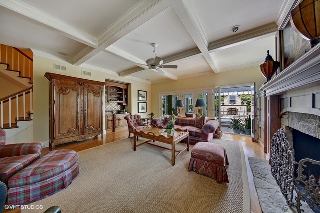 607 West Maple Street Hinsdale, IL 60521 - Photo 15 of 59 a living room with furniture and a fireplace