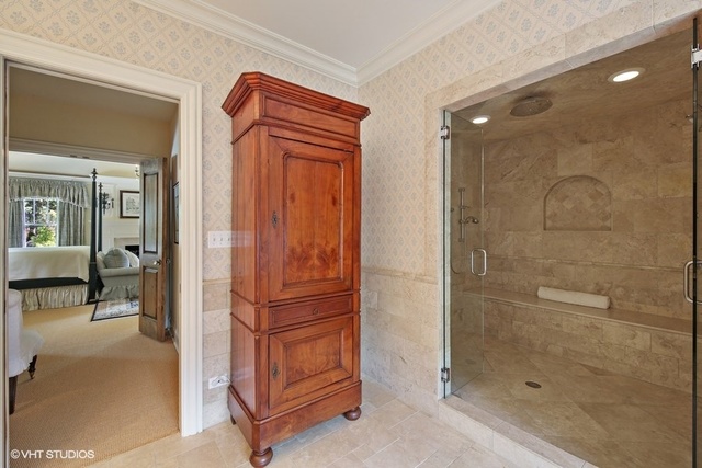 607 West Maple Street Hinsdale, IL 60521 - Photo 23 of 59 a bathroom with a shower and a sink