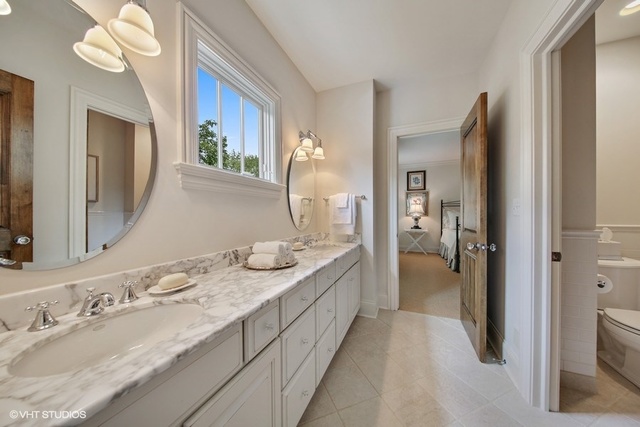 607 West Maple Street Hinsdale, IL 60521 - Photo 27 of 59 a en suite bathroom with a double vanity sink and a mirror