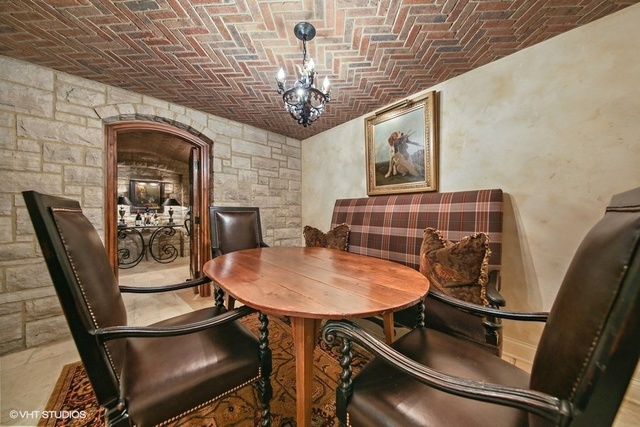 607 West Maple Street Hinsdale, IL 60521 - Photo 35 of 59 a dining room with furniture and chandelier
