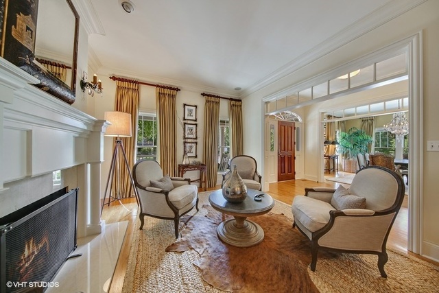 607 West Maple Street Hinsdale, IL 60521 - Photo 5 of 59 a living room with furniture and a fireplace