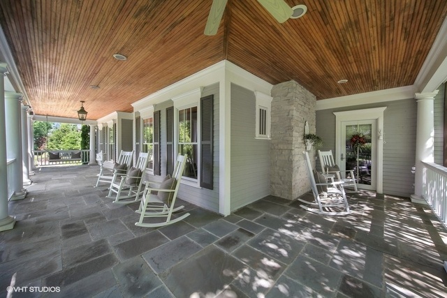 607 West Maple Street Hinsdale, IL 60521 - Photo 42 of 59 a view of a patio with table and chairs and wooden fence