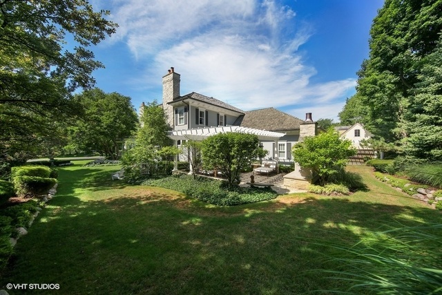607 West Maple Street Hinsdale, IL 60521 - Photo 45 of 59 a view of a house with a big yard and large trees