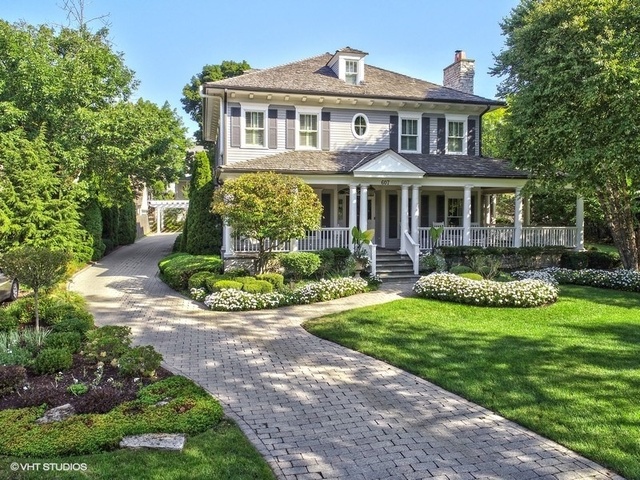 607 West Maple Street Hinsdale, IL 60521 - Photo 51 of 59 a front view of a house with a yard and potted plants