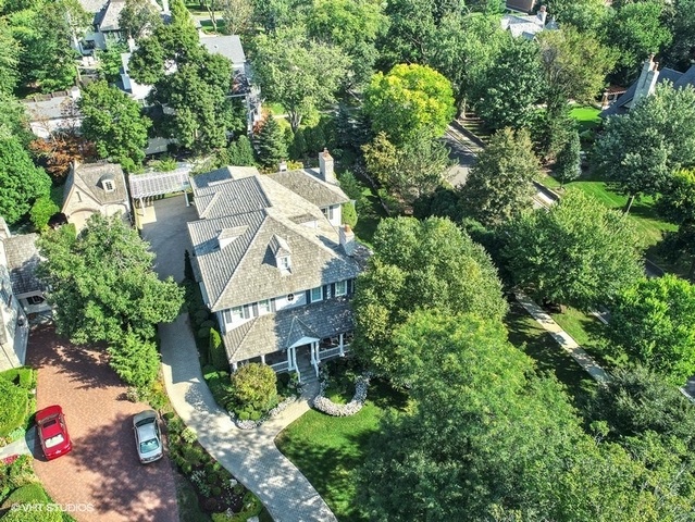 607 West Maple Street Hinsdale, IL 60521 - Photo 53 of 59 an aerial view of residential house with outdoor space and trees all around