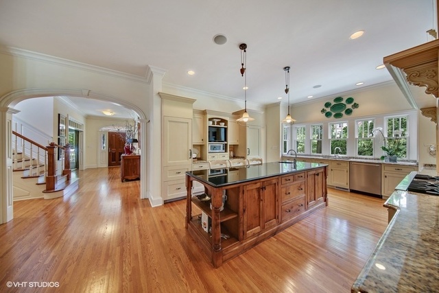 607 West Maple Street Hinsdale, IL 60521 - Photo 8 of 59 a large kitchen with stainless steel appliances lots of counter space and wooden floor