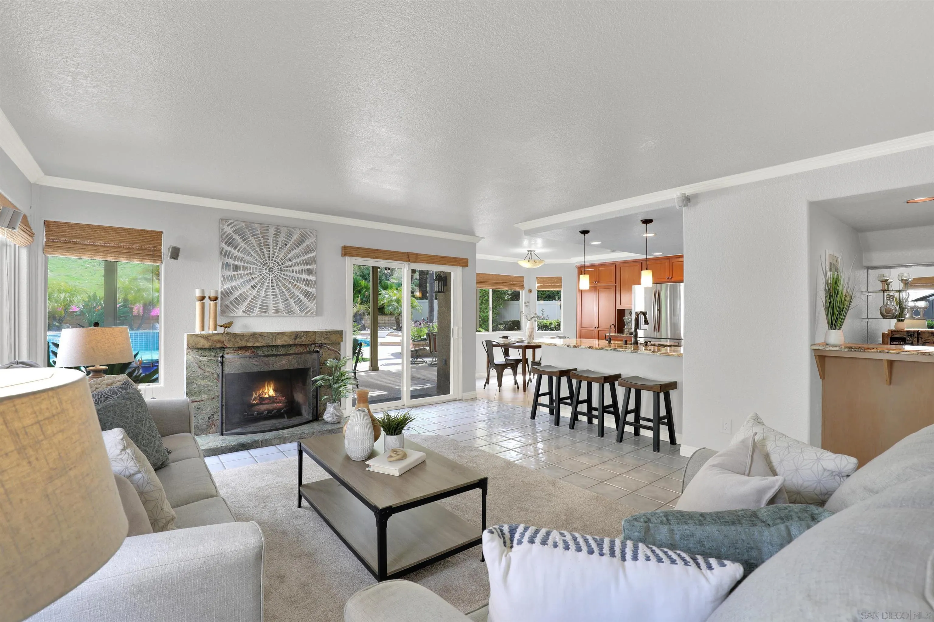 13901 Carriage Road Poway, CA 92064 - Photo 12 of 37 a living room with furniture and a fireplace