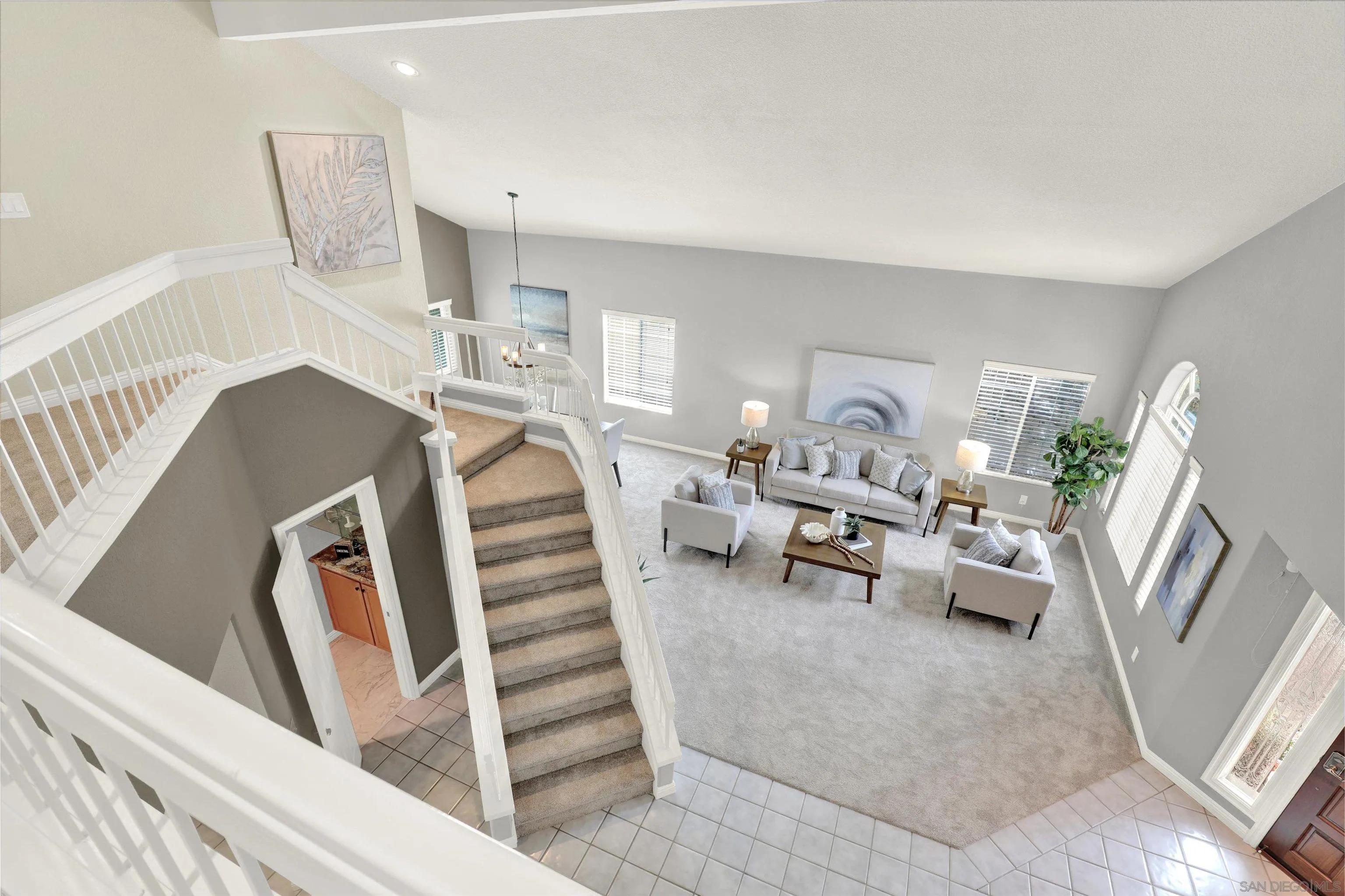 13901 Carriage Road Poway, CA 92064 - Photo 17 of 37 a living room with furniture and a wooden floor