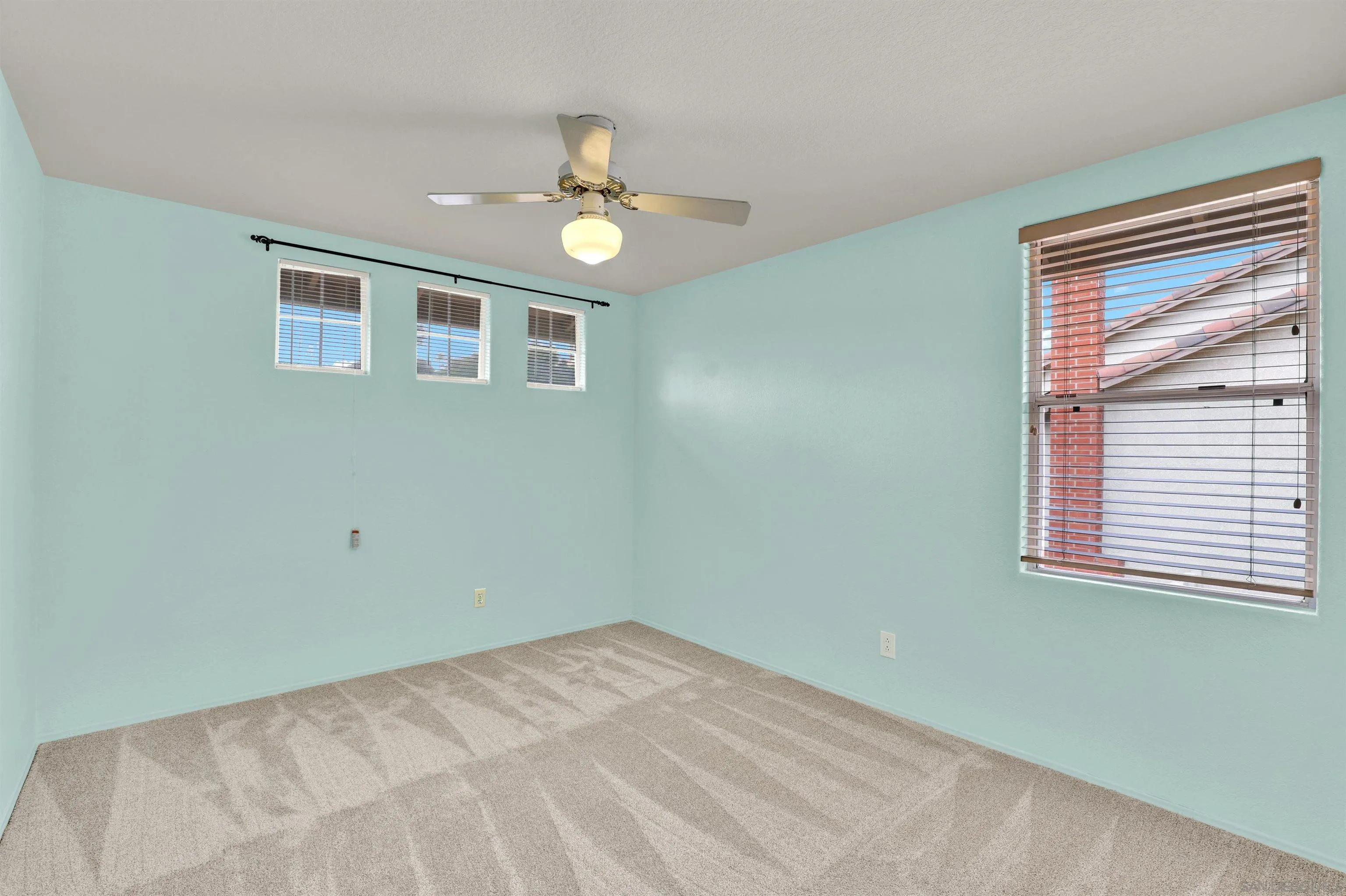 13901 Carriage Road Poway, CA 92064 - Photo 22 of 37 a view of empty room with window and ceiling fan