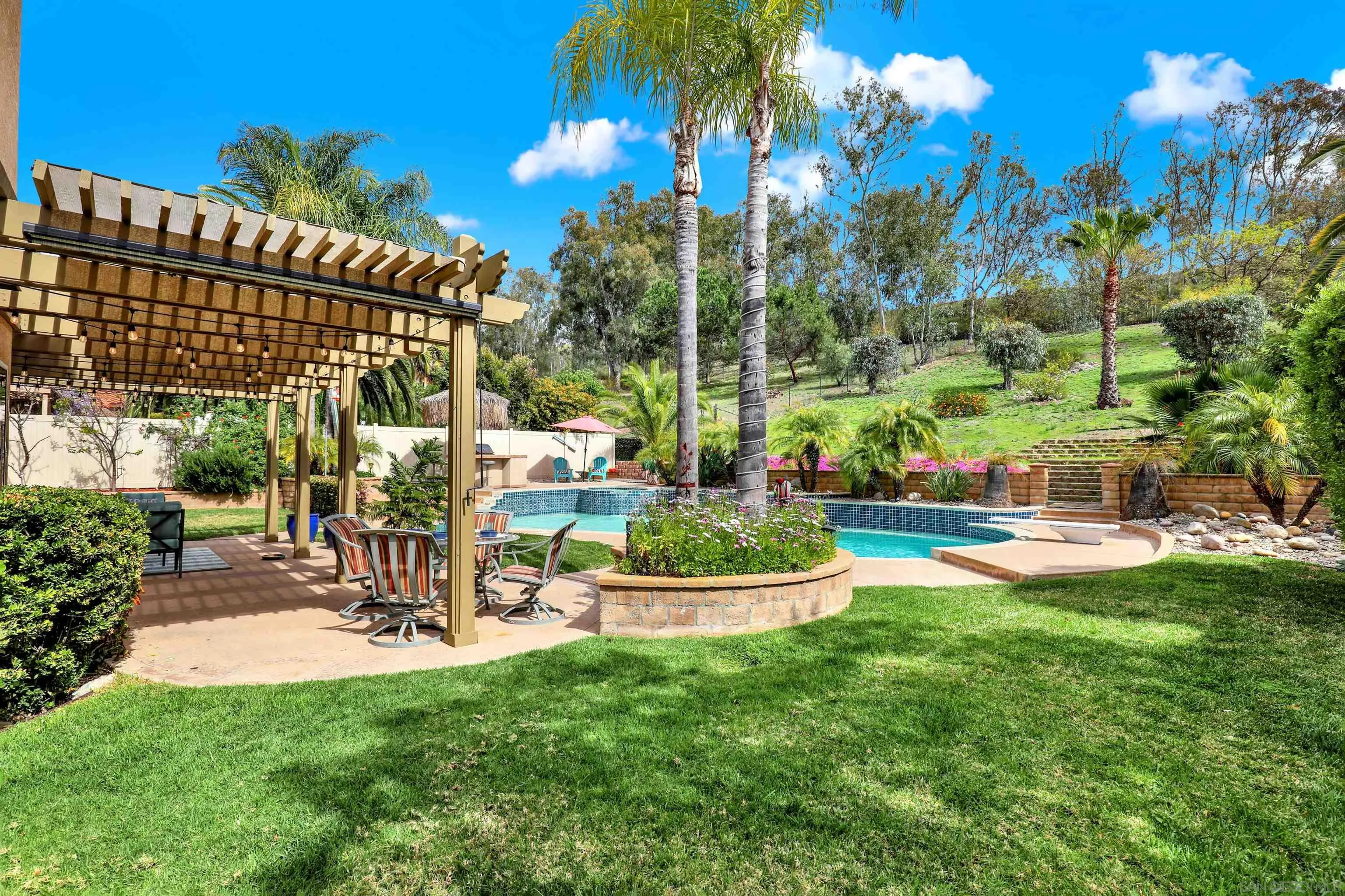 13901 Carriage Road Poway, CA 92064 - Photo 28 of 37 a view of a house with backyard and sitting area