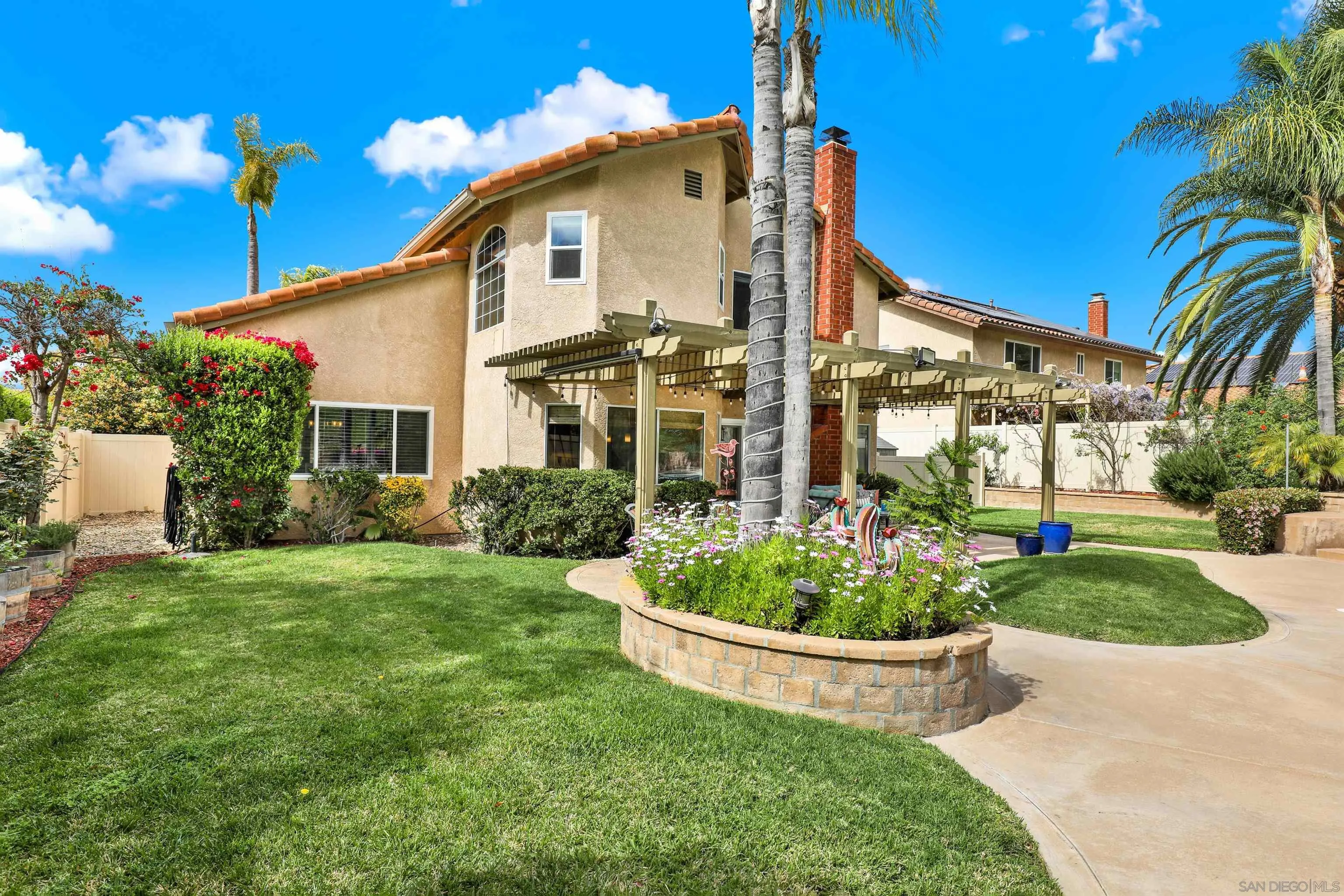 13901 Carriage Road Poway, CA 92064 - Photo 29 of 37 a front view of a house with a yard