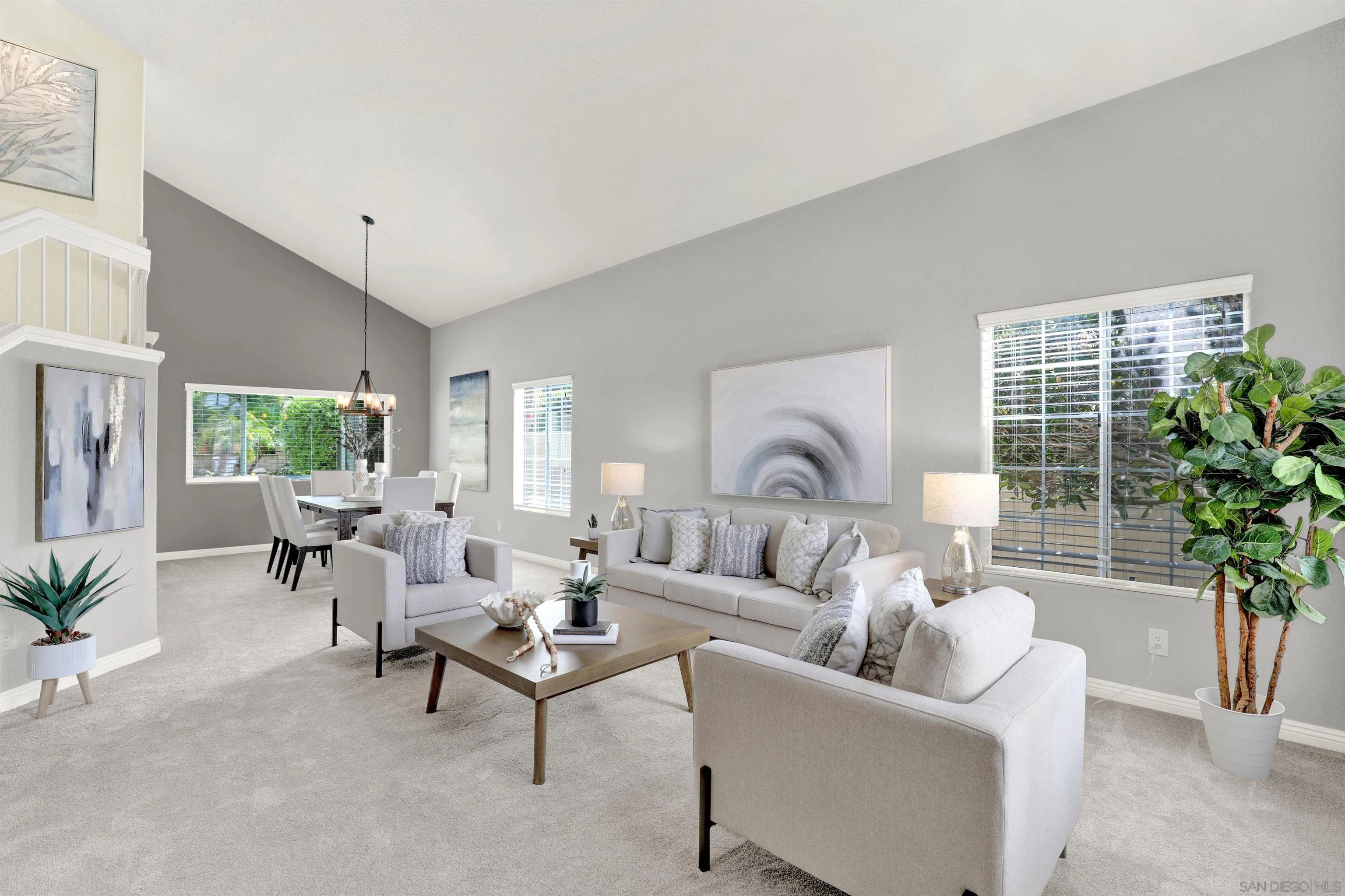 13901 Carriage Road Poway, CA 92064 - Photo 7 of 37 a living room with furniture potted plant floor and a large window