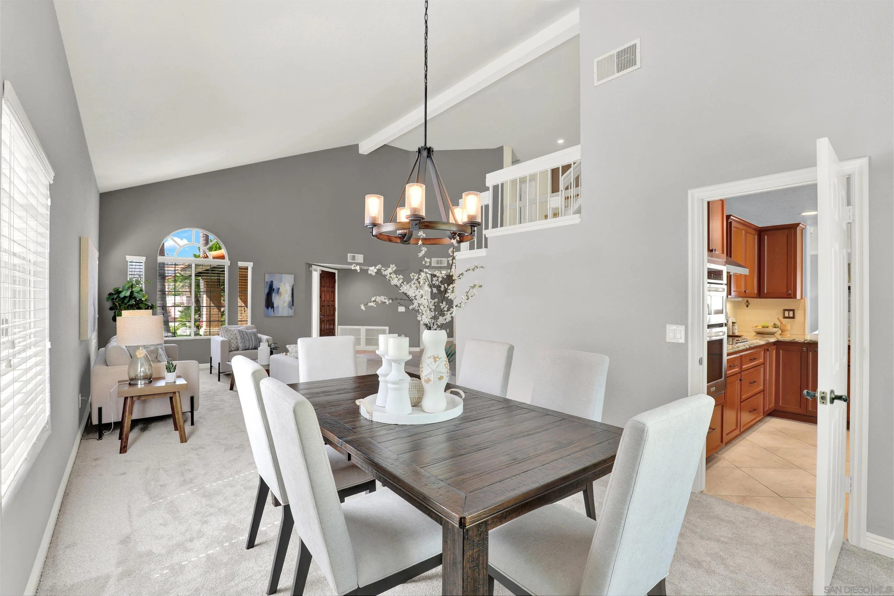 13901 Carriage Road Poway, CA 92064 - Photo 8 of 37 a view of a dining room with furniture and chandelier
