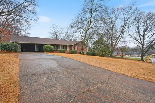 a house with trees in front of it