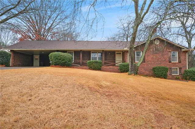 front view of a house with a yard
