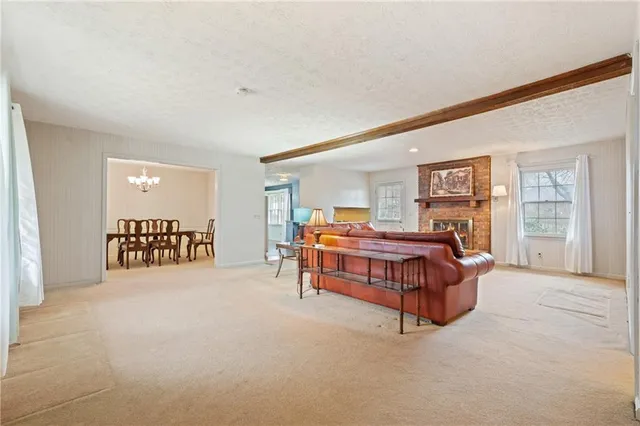 a bed room with a bed and dresser