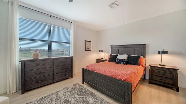 a front view of house with yard and swimming pool