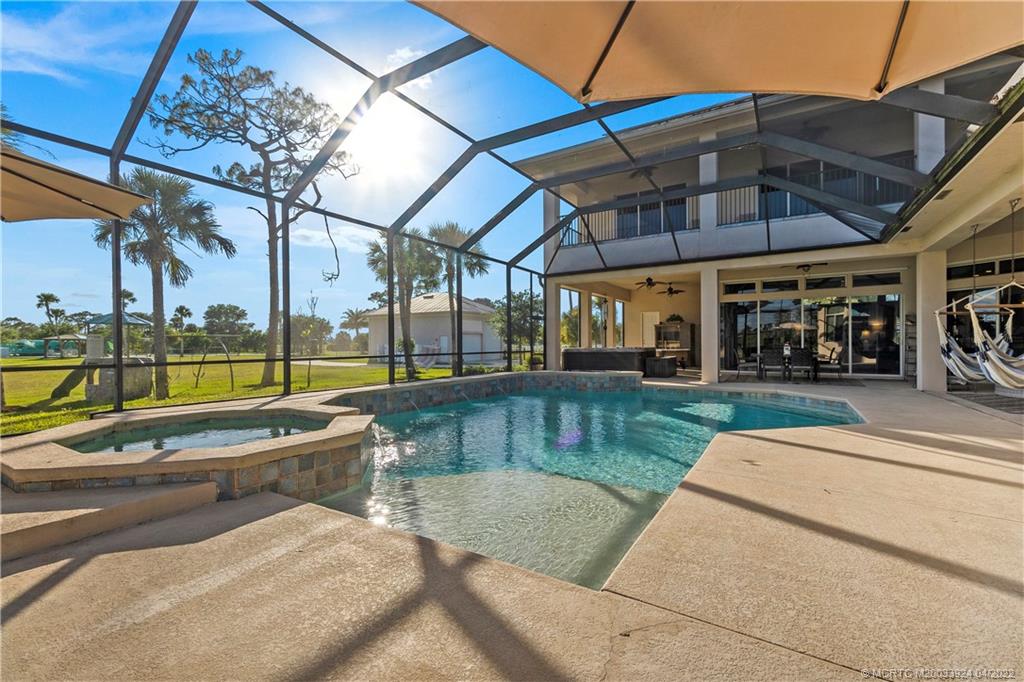 2937 Southwest Trailside Path Stuart, FL 34997 - Photo 60 of 78 Spacious screened pool area
