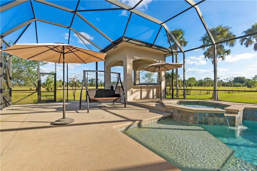 2937 Southwest Trailside Path Stuart, FL 34997 - Photo 61 of 78 Spacious screened pool area