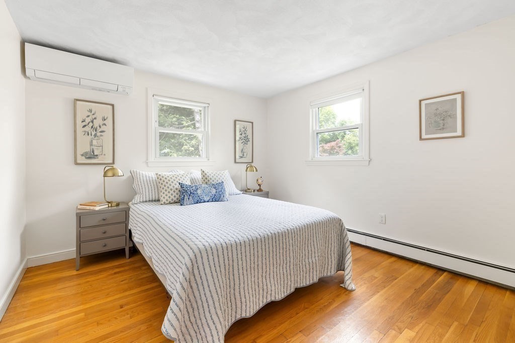 21 Vanderbelt Road Acton, MA 01720 - Photo 18 of 36 a bedroom with a bed and window