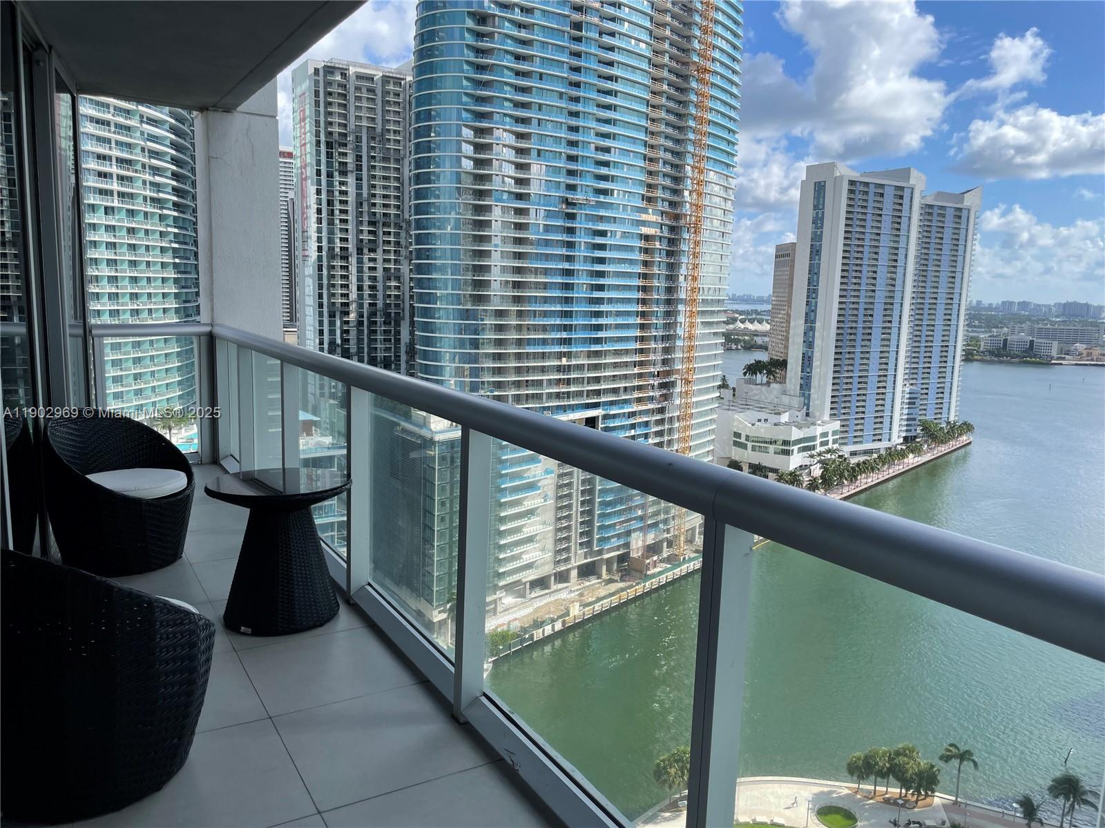 485 Brickell Avenue, Unit 2602 Miami, FL 33131 - Photo 17 of 19 a view of balcony with chairs