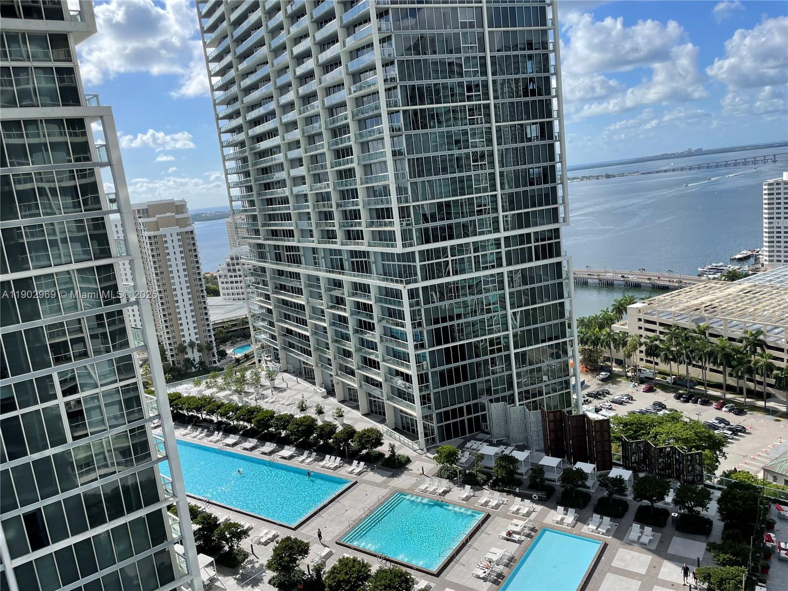 485 Brickell Avenue, Unit 2602 Miami, FL 33131 - Photo 2 of 19 a view of a blue building with a outdoor space