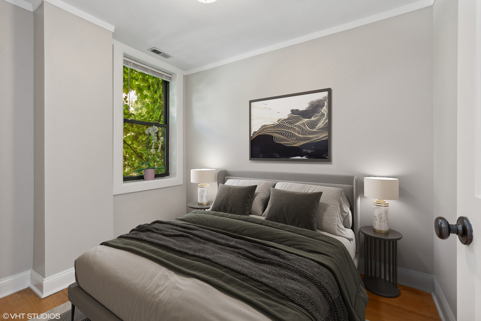 4144 North Sheridan Road, Unit 205 Chicago, IL 60613 - Photo 12 of 18 a bedroom with a bed and a window