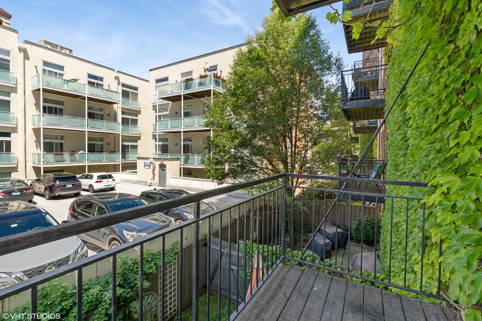 4144 North Sheridan Road, Unit 205 Chicago, IL 60613 - Photo 16 of 18 a view of balcony with a potted plant and stairs