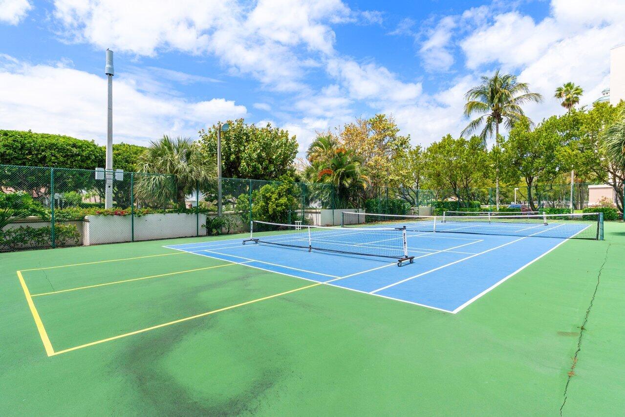 176 Helios Drive, Unit 104 Jupiter, FL 33477 - Photo 26 of 59 a view of a tennis court