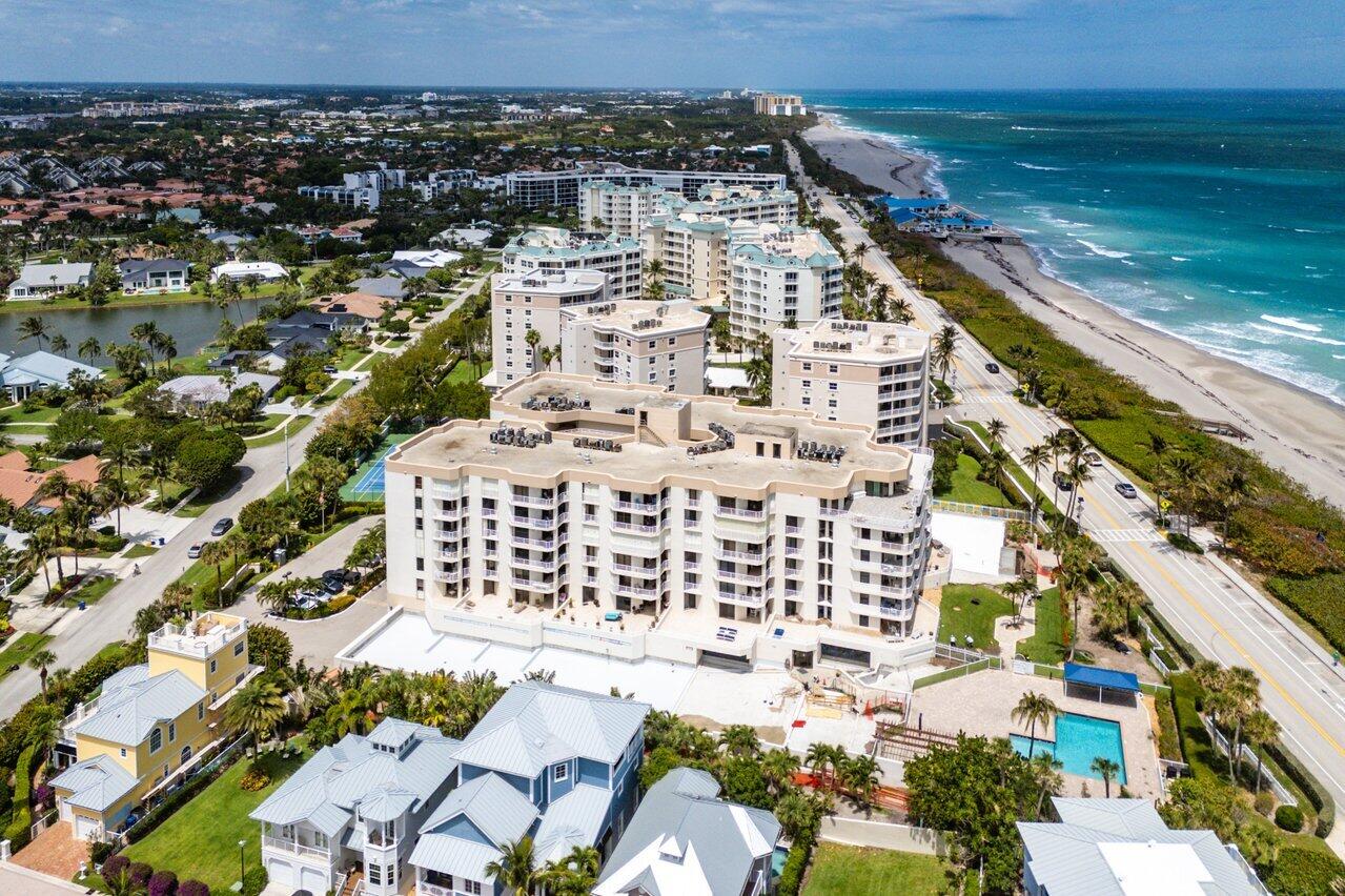 176 Helios Drive, Unit 104 Jupiter, FL 33477 - Photo 3 of 59 a view of a city with ocean view