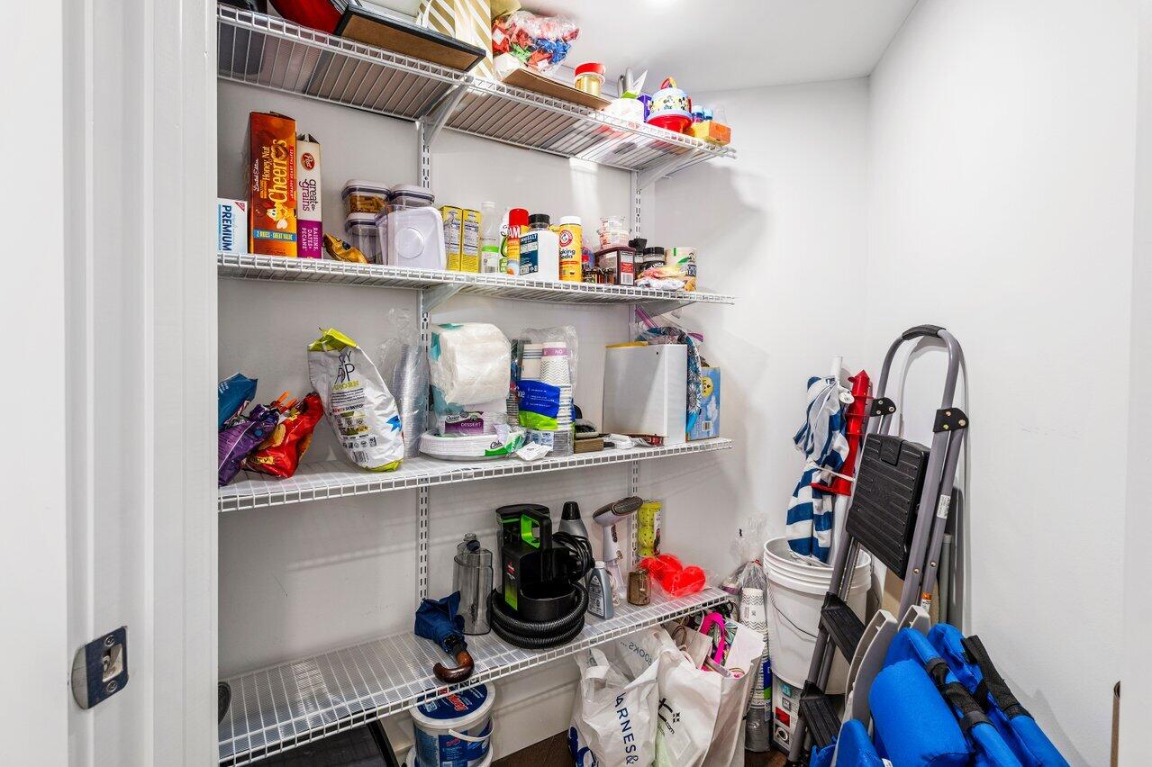 176 Helios Drive, Unit 104 Jupiter, FL 33477 - Photo 33 of 59 a room with storage and utility