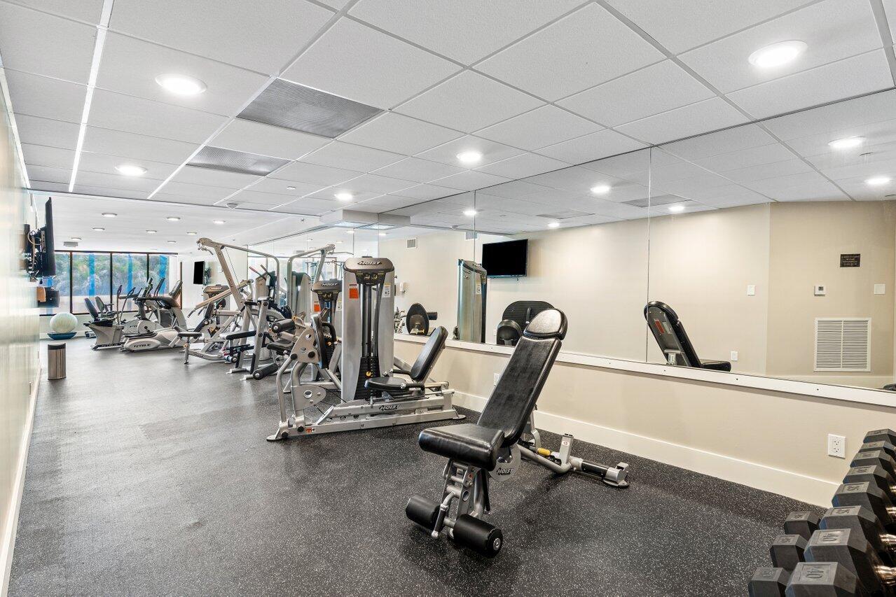 176 Helios Drive, Unit 104 Jupiter, FL 33477 - Photo 43 of 59 a view of a room with gym equipment