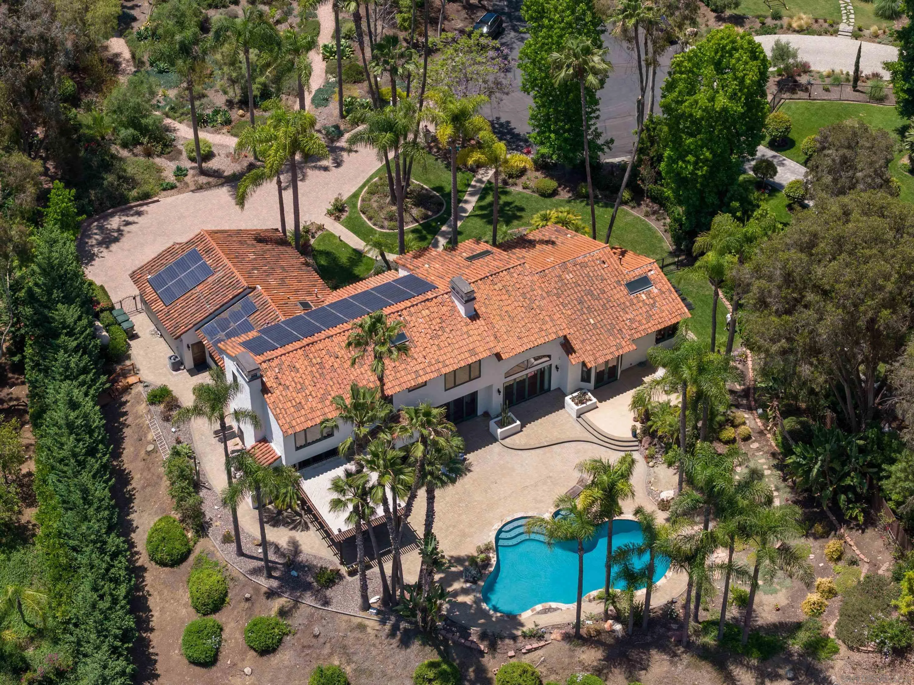 3028 Paseo Cielo Rancho Santa Fe, CA 92024 - Photo 49 of 50 an aerial view of a house with a yard