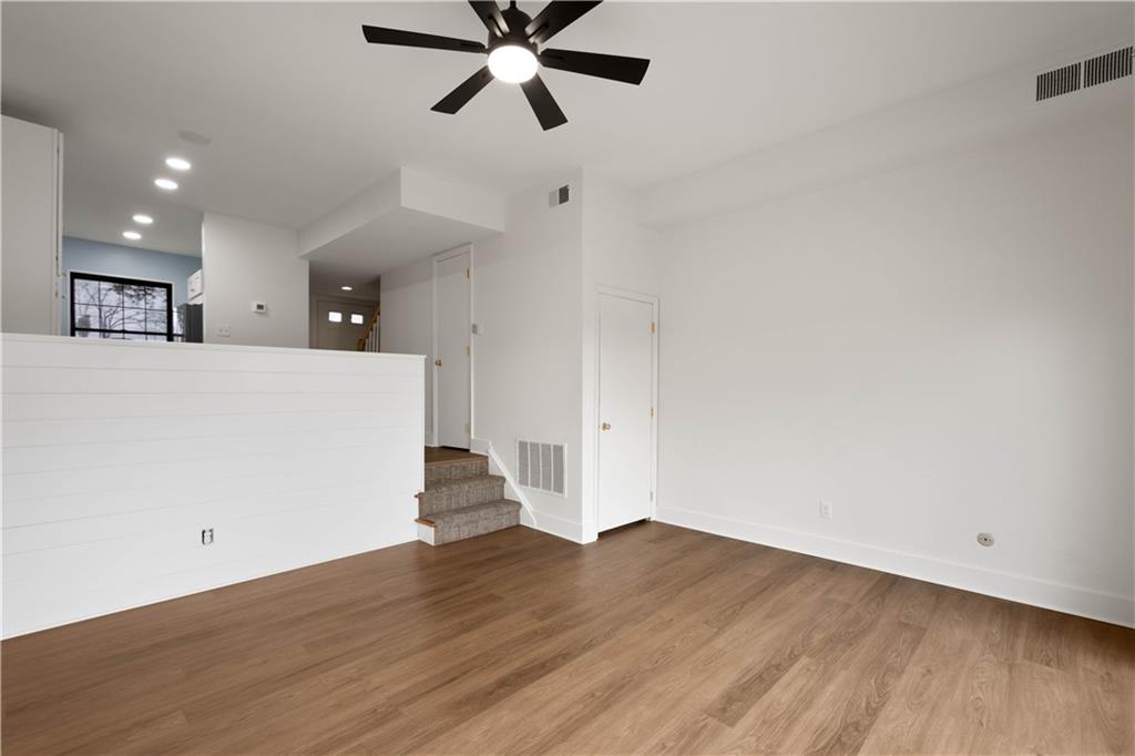 139 Community Court Pittsburgh, PA 15205 - Photo 16 of 32 a view of a kitchen with wooden floor and a ceiling fan
