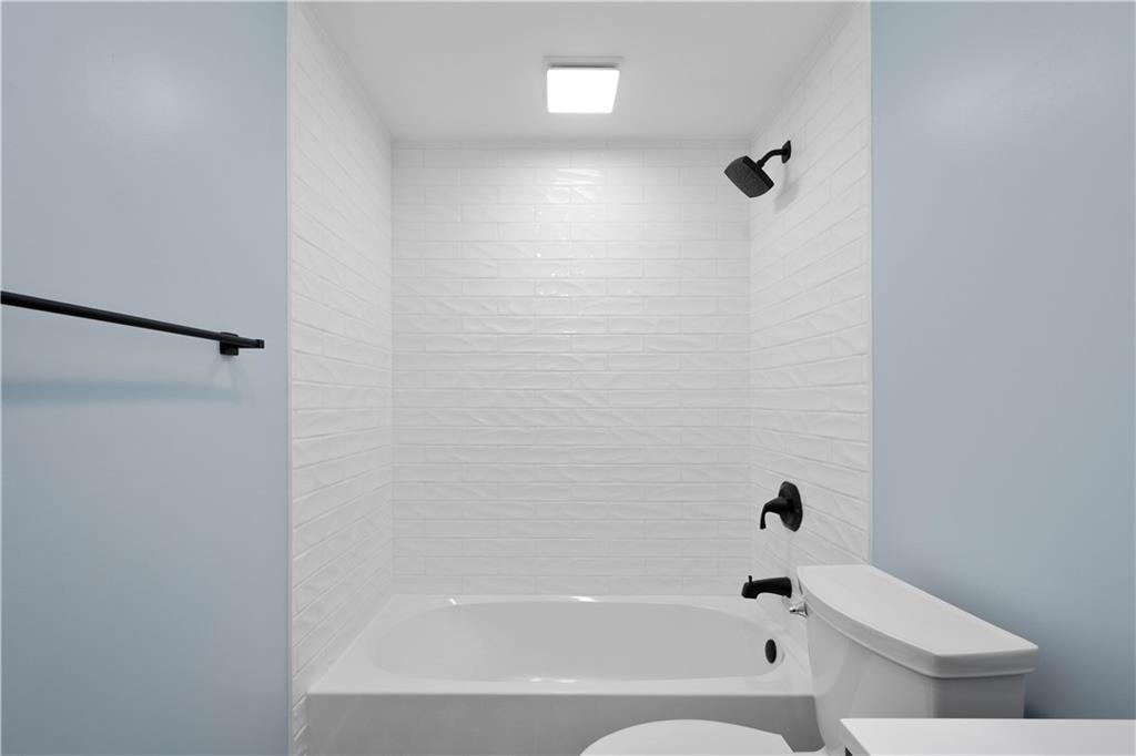139 Community Court Pittsburgh, PA 15205 - Photo 21 of 32 a bathroom with a bathtub and a shower