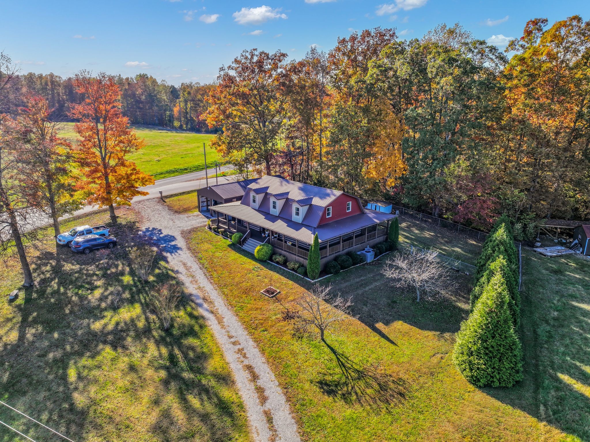 a view of a backyard with swimming pool