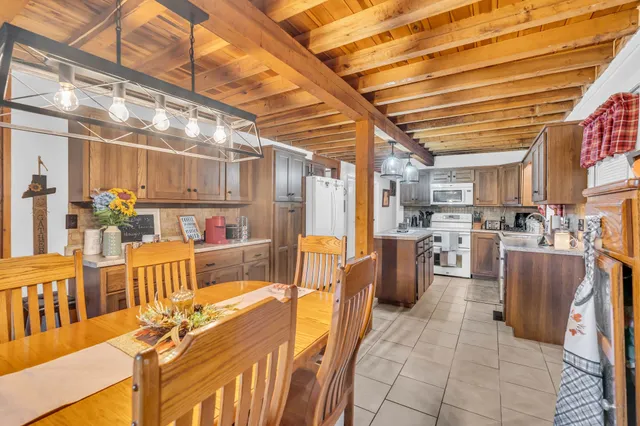 a view of a kitchen with furniture and a kitchen