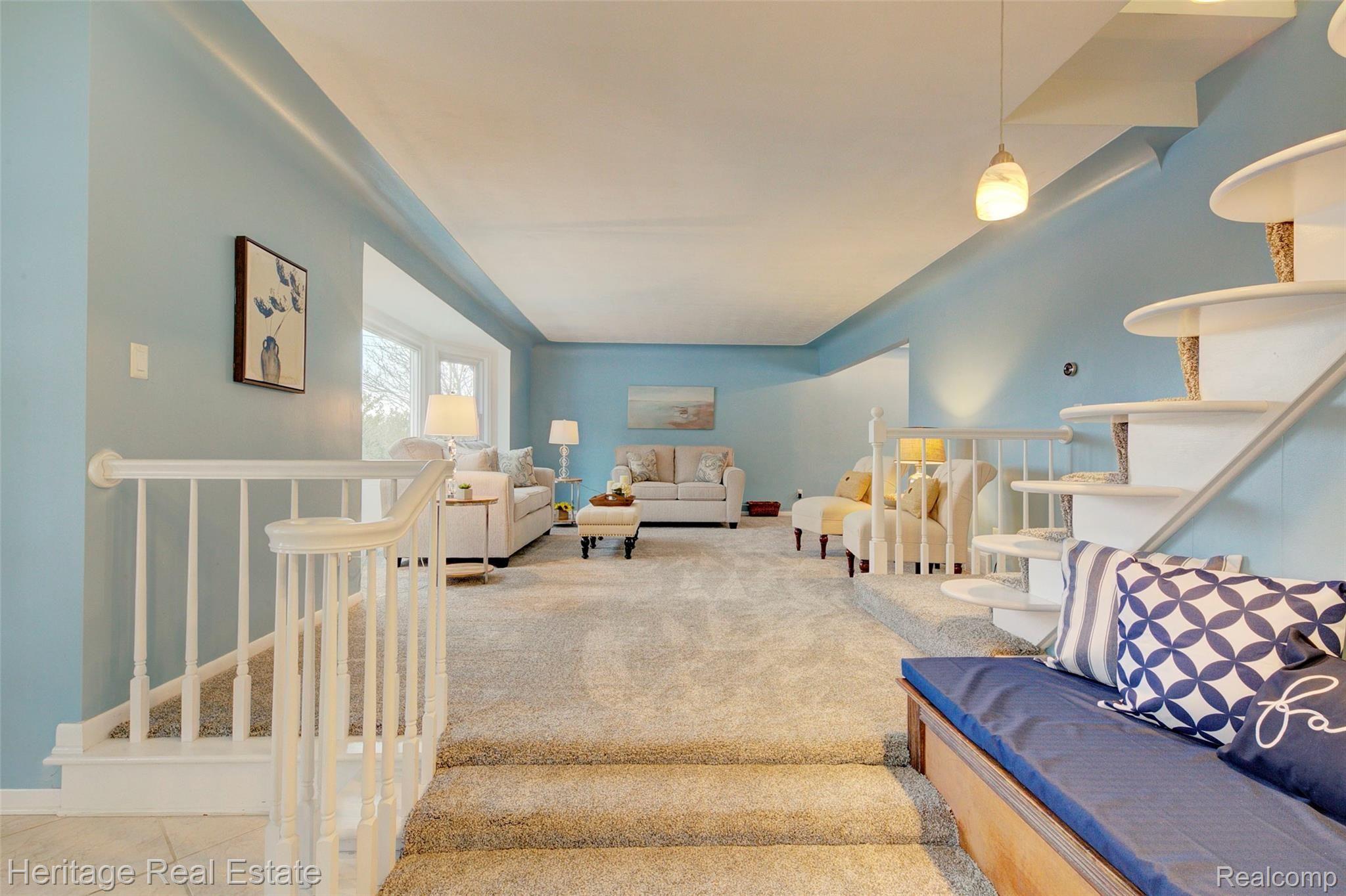 654 Old Perch Road Rochester, MI 48309 - Photo 5 of 61 Living room is very spacious and features a large bay window, brand new carpet and a cove ceiling.