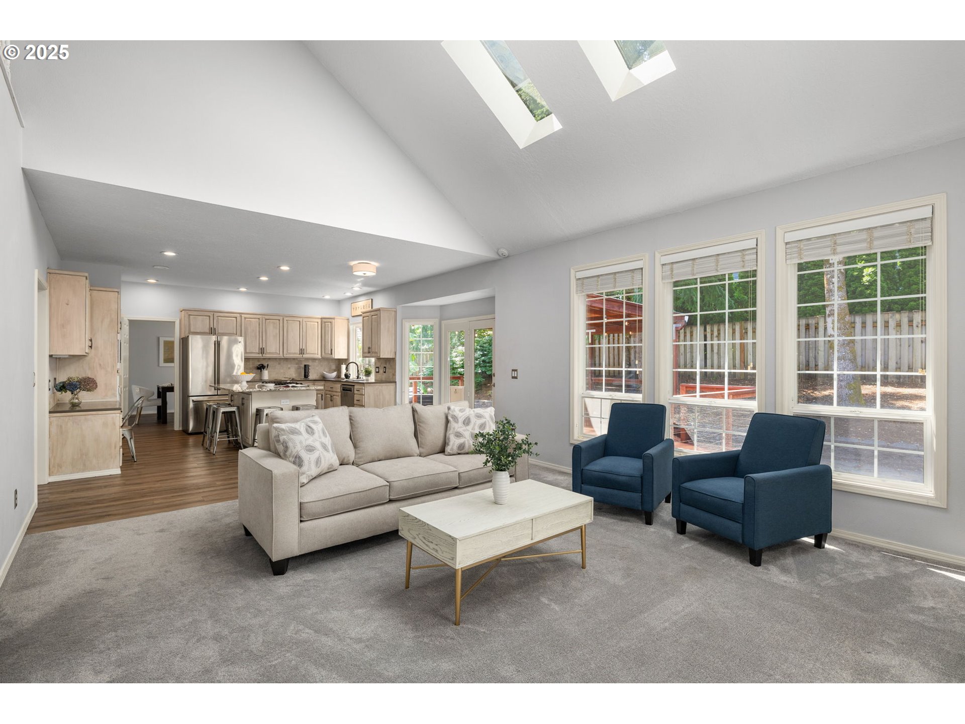 6783 Apollo Road West Linn, OR 97068 - Photo 13 of 42 a living room with furniture and a large window