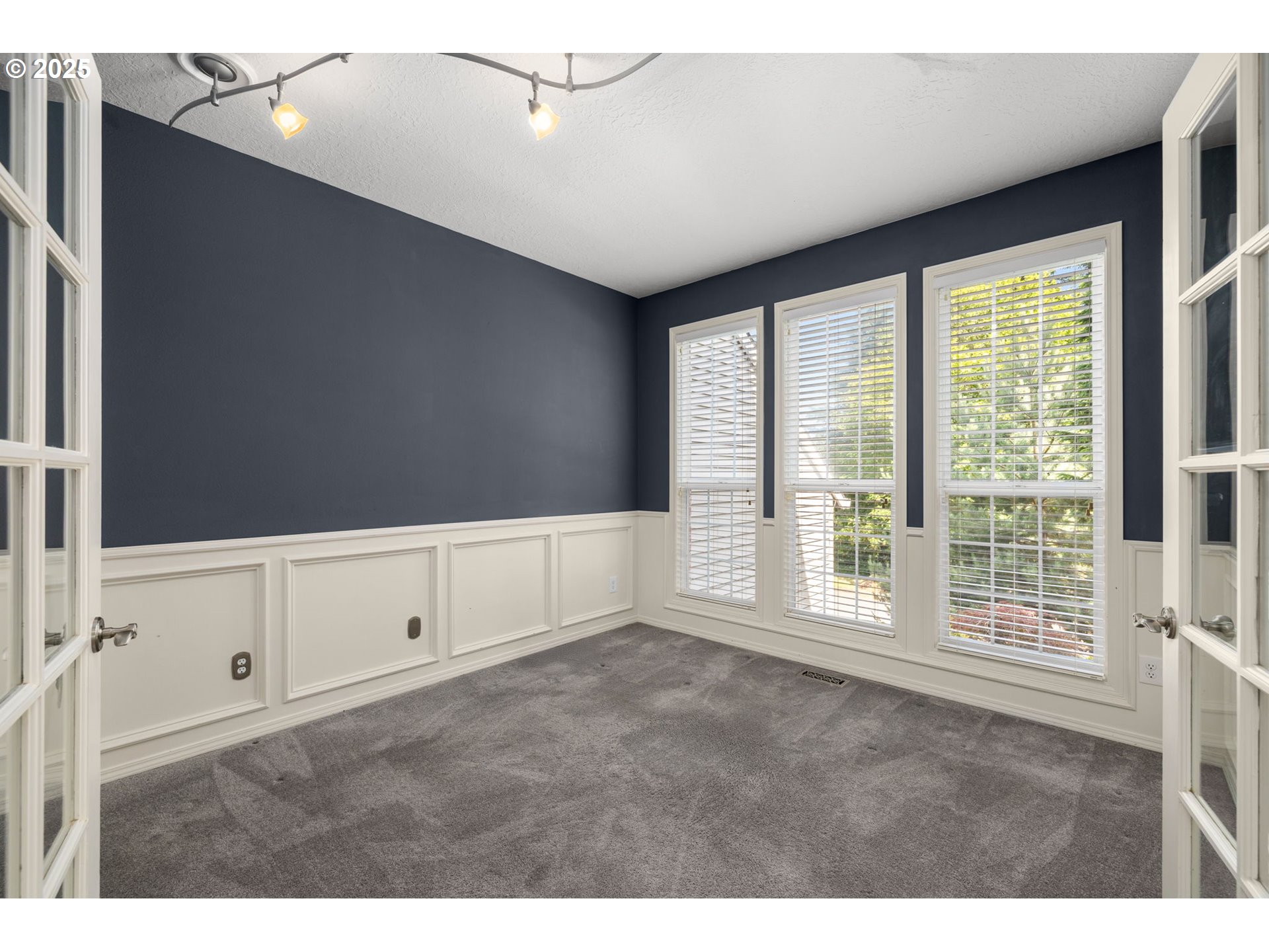 6783 Apollo Road West Linn, OR 97068 - Photo 15 of 42 a view of an empty room with a window